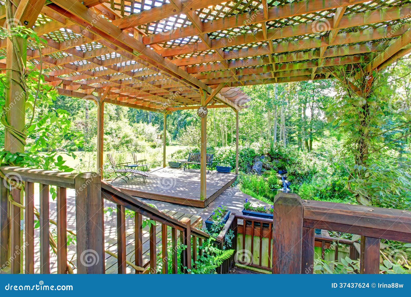 Backyard Farm Deck With Attached Open Pergola Stock Photo 